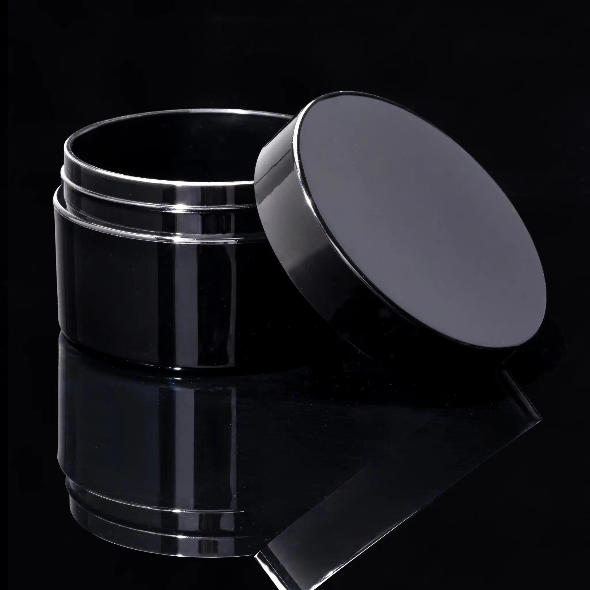 Impact 100ml PCR glossy black PP single wall cosmetic jar open showing interior for creams - Cosmetic Packaging Now