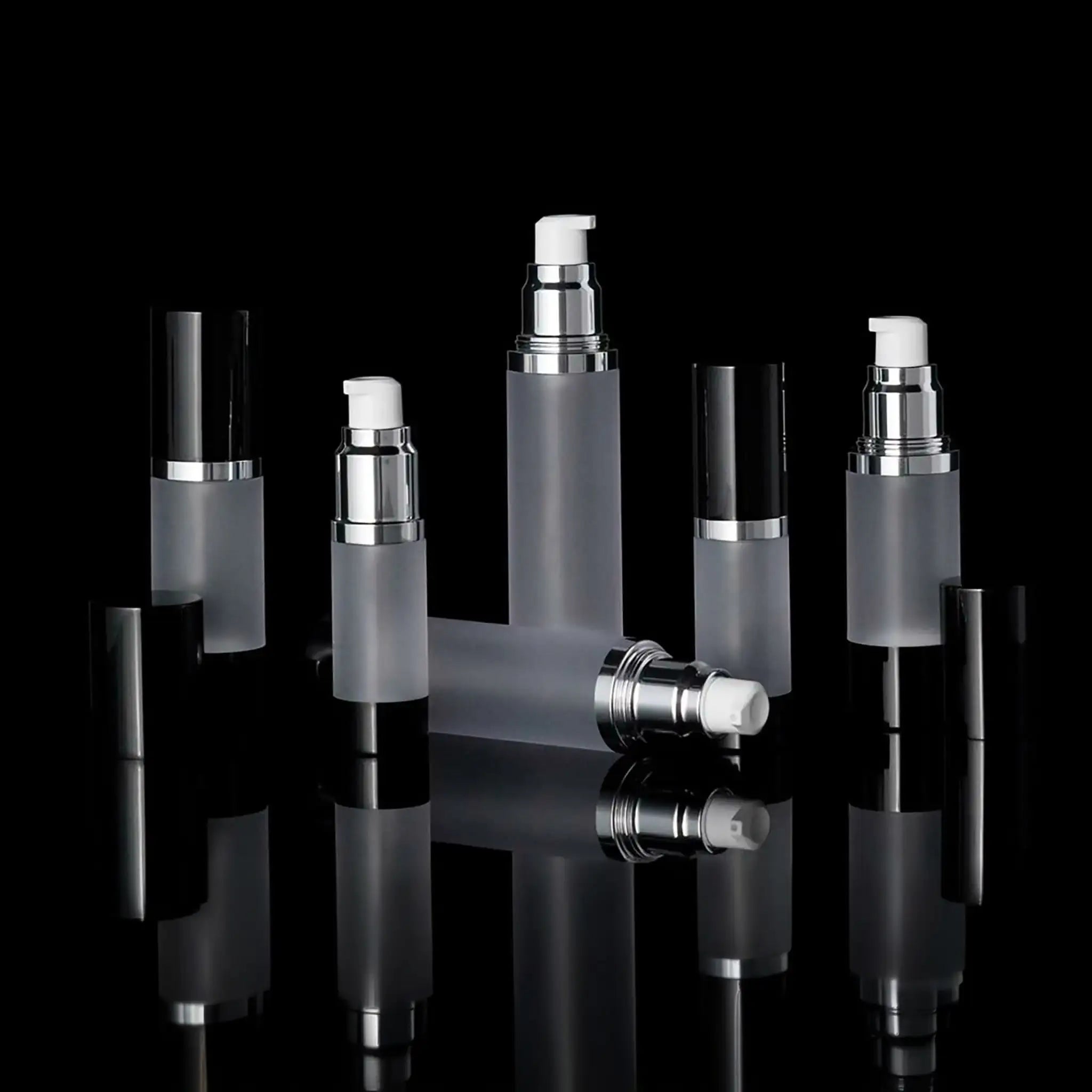 Luxe 50 ML Airless Bottle Glossy Black with Frosted Bottle - Cosmetic Packaging Now