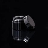Impact 15ml PCR glossy black PP single wall cosmetic jar open showing interior for creams - Cosmetic Packaging Now