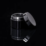 Impact 30ml PCR glossy black PP single wall cosmetic jar open showing interior for creams - Cosmetic Packaging Now