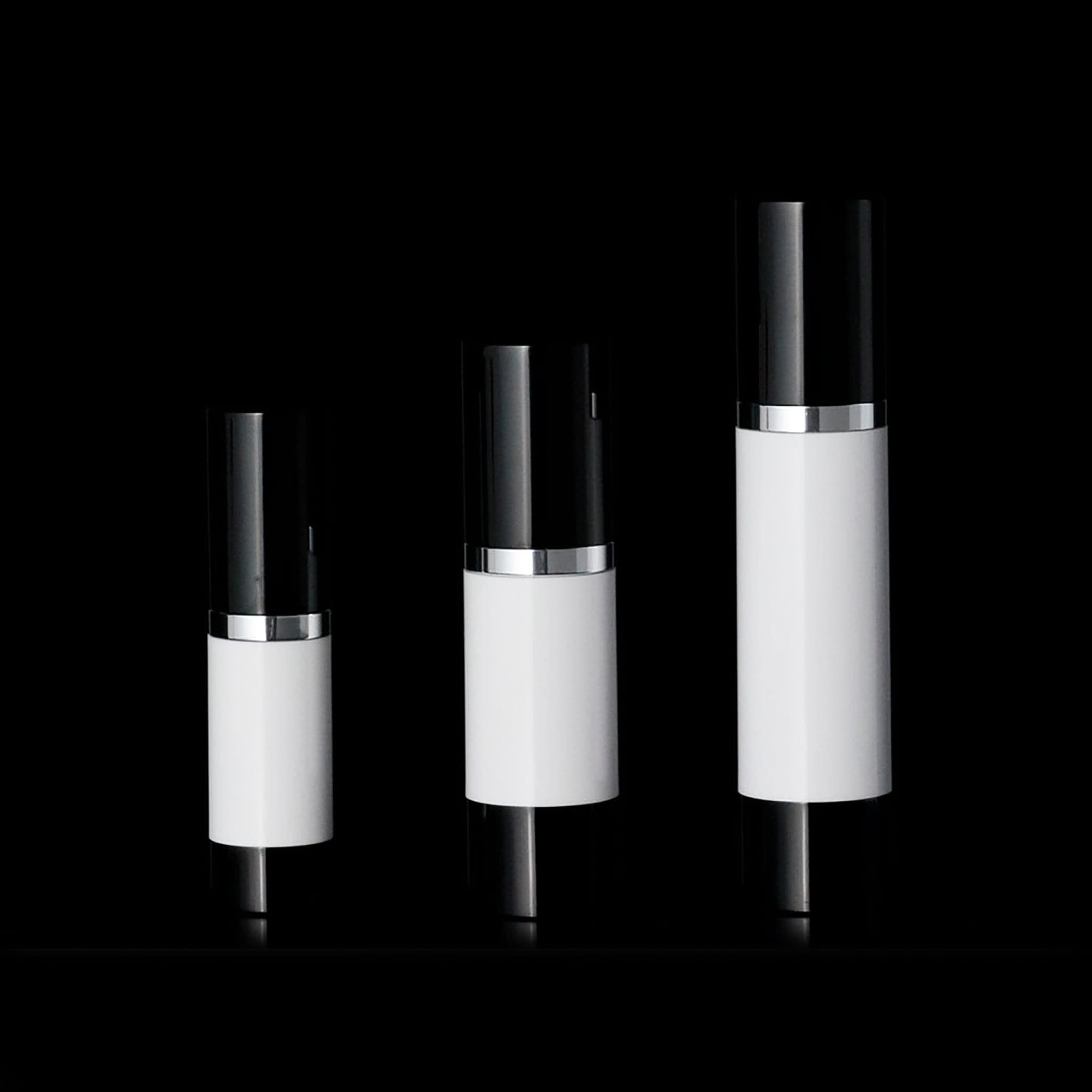 Luxe 30 ML Airless Bottle Glossy Black with White Bottle - Cosmetic Packaging Now